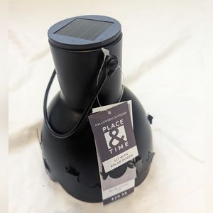 Black metal solar light with bat shade